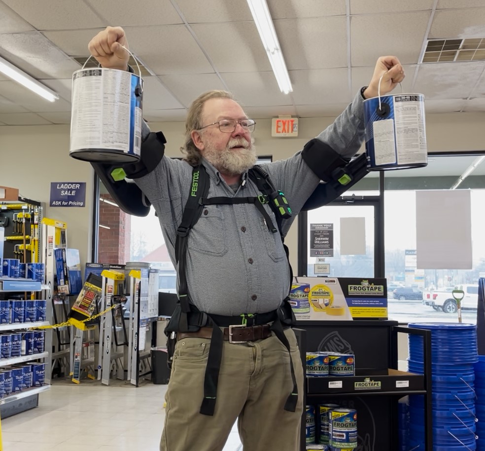 Festool ExoActive exoskeleton with paint cans