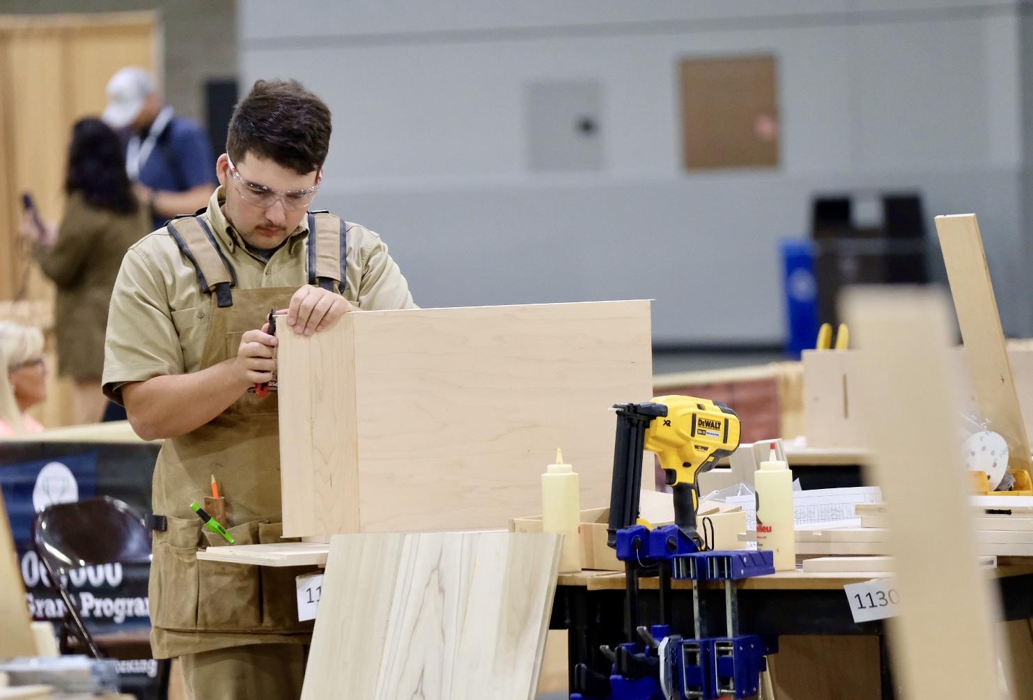 Joshua Scism of Cedar Ridge High School competes at SkillsUSA Cabinetmaking competiton