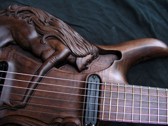 Carved Walnut Guitar Features Mermaid Motif | Woodworking Network