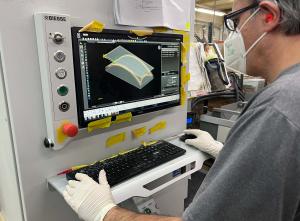 Arbor Mills operator using CNC router.