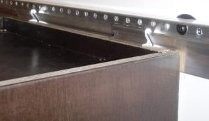 C-Hang the cabinet on the rail.
