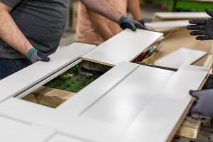 A door is assembled at one of the company’s many production, assembly and warehouse facilities.