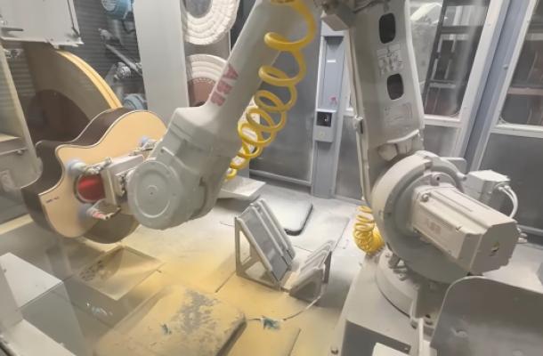 Robot buffing at Taylor Guitars