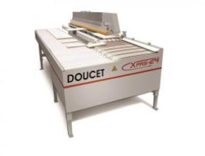Doucet return conveyor