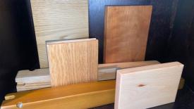 Samples of powder coating on wood.