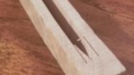 Cutting a prong to test wood for casehardening