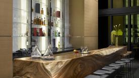 phillipscolleciton-porsche_design_tower_-_tree_trunk_bar_1.jpg