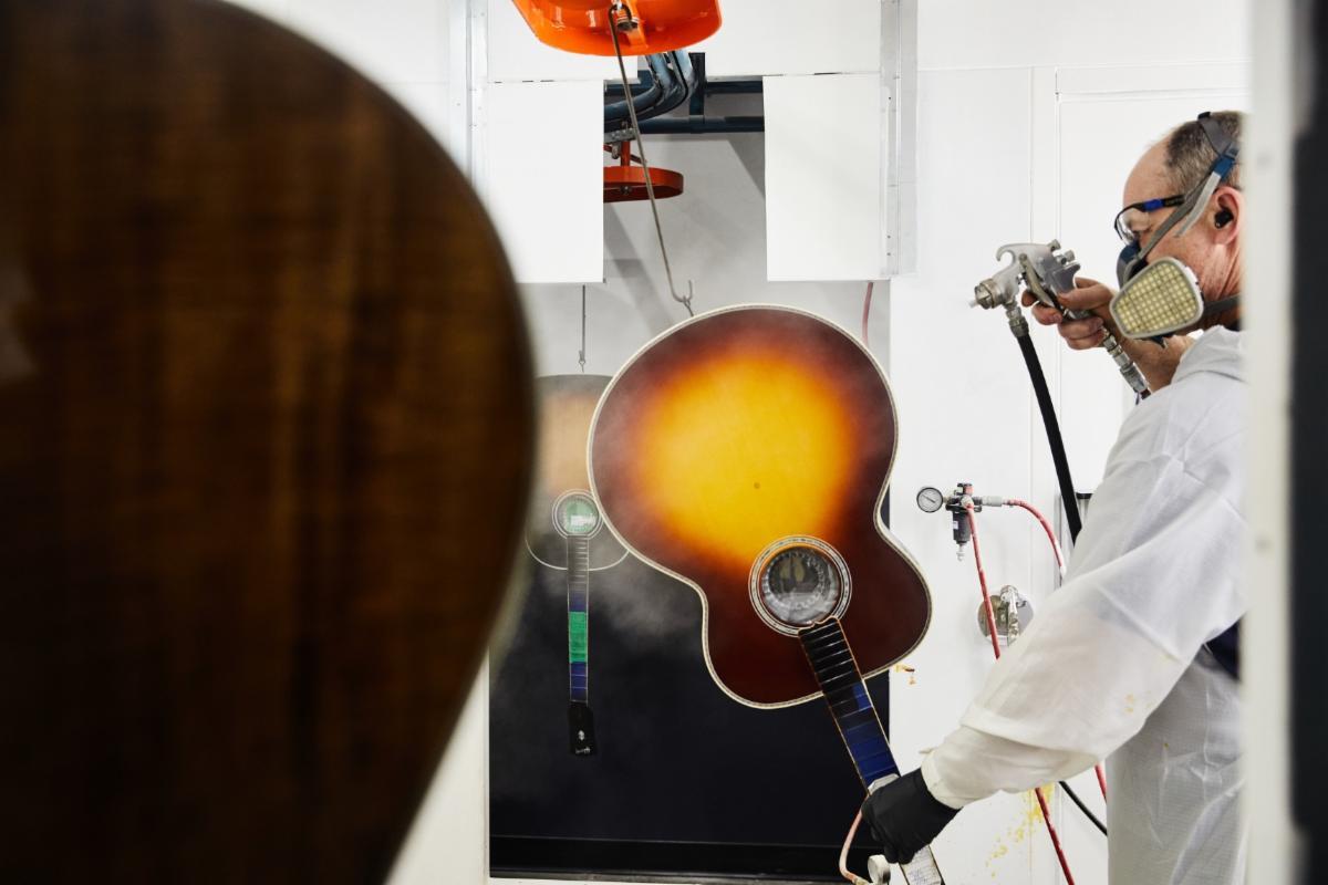 Applying a Rosewood Burst finish at Gibson Guitars