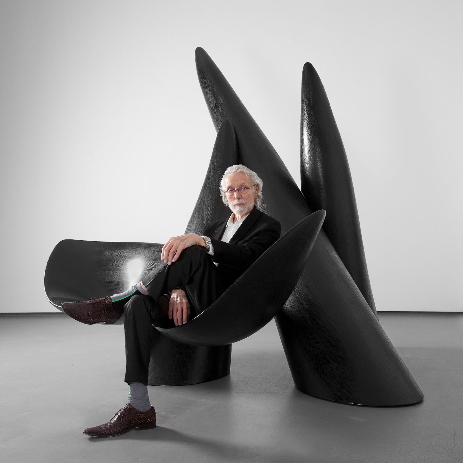 Wendell Castle seated in sculpture