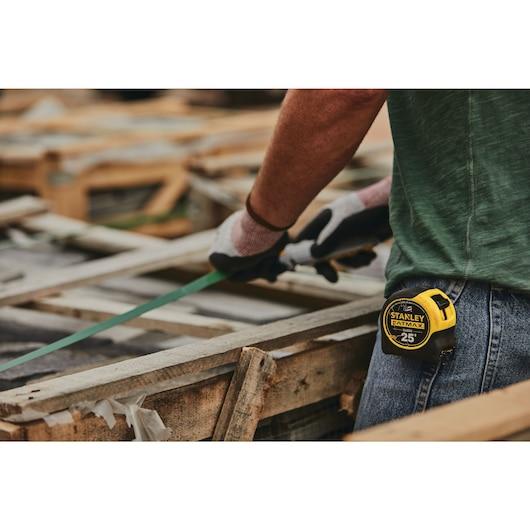 Stanley tape measure on hip
