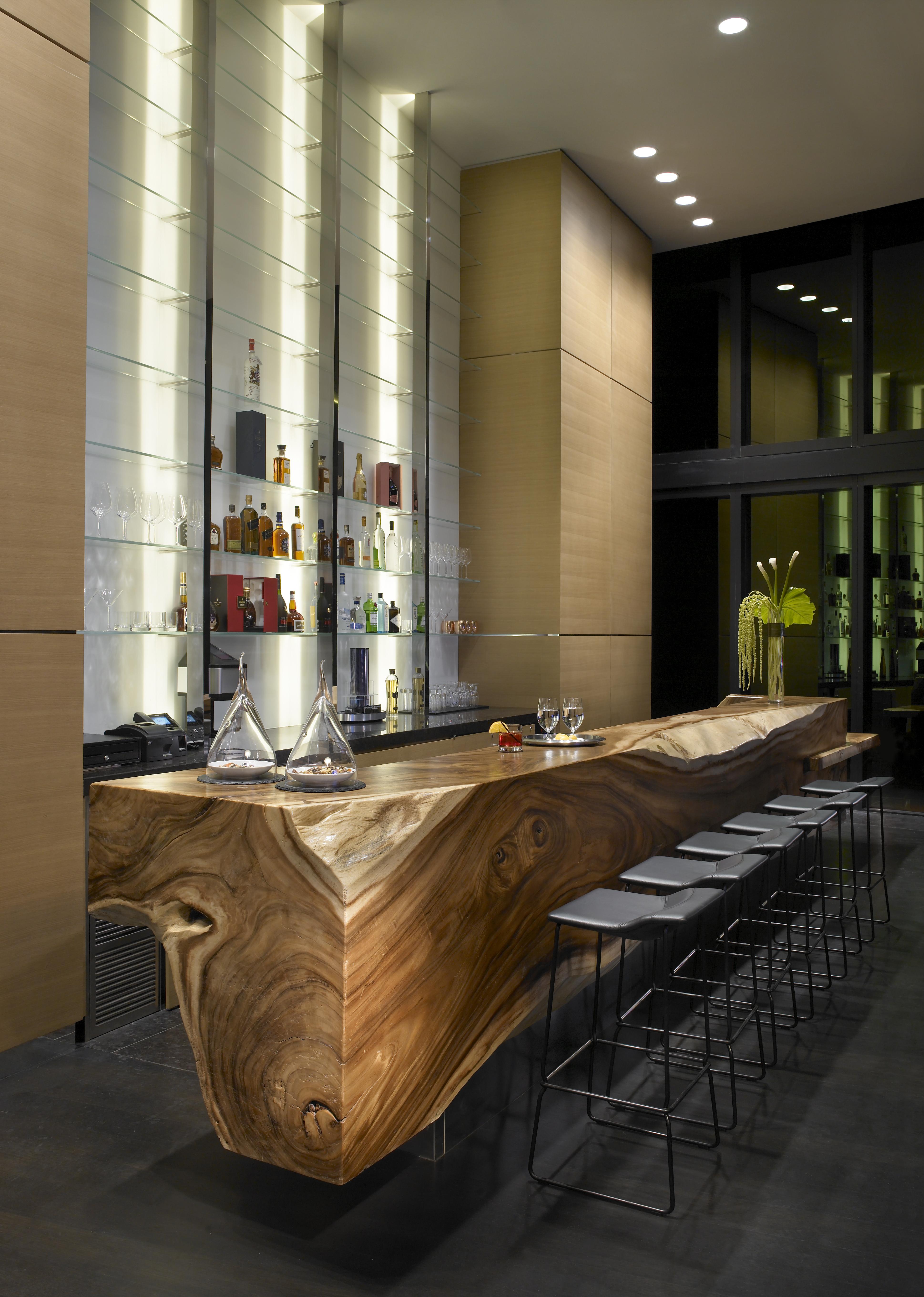 phillipscolleciton-porsche_design_tower_-_tree_trunk_bar_1.jpg